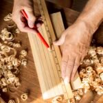 carpenter-measuring-with-ruler-pencil carpenter-measuring-with-ruler-pencil